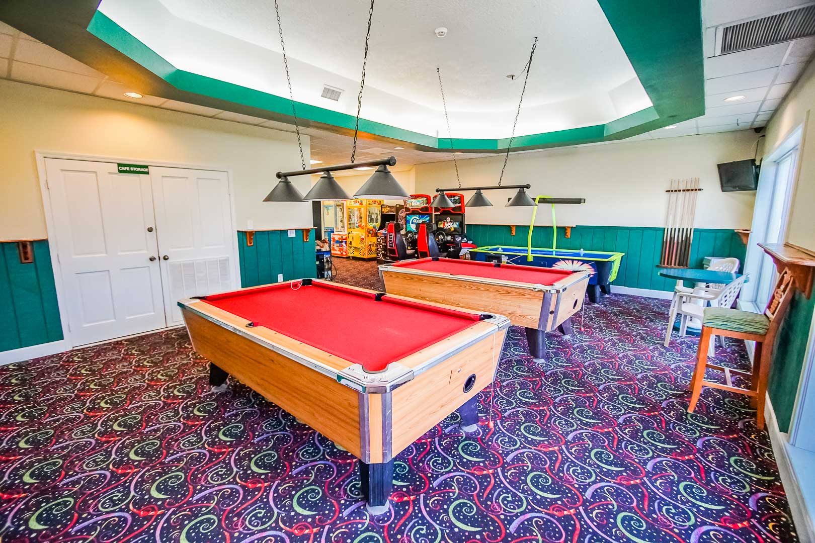 A vibrant game room at VRI's Discovery Beach Resort in Cocoa Beach, Florida.